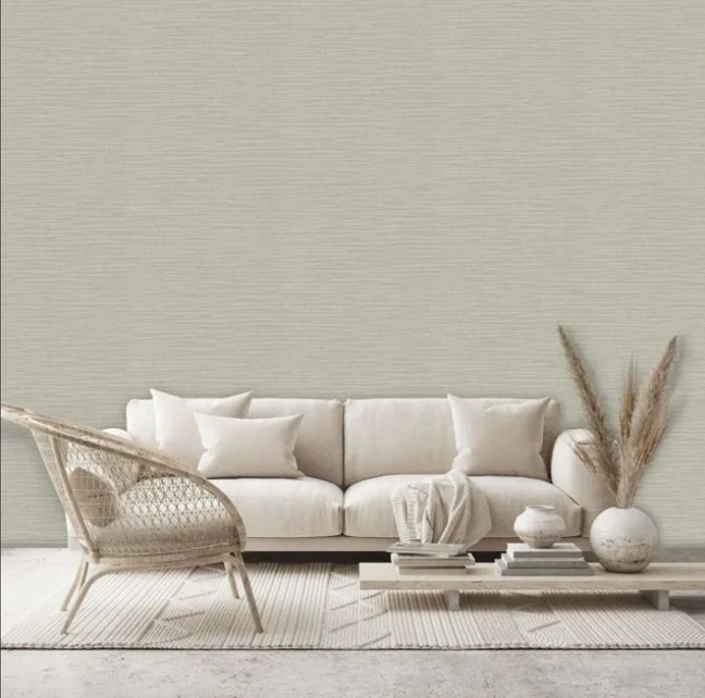 Modern living room featuring neutral beige paste the wall wallpaper
