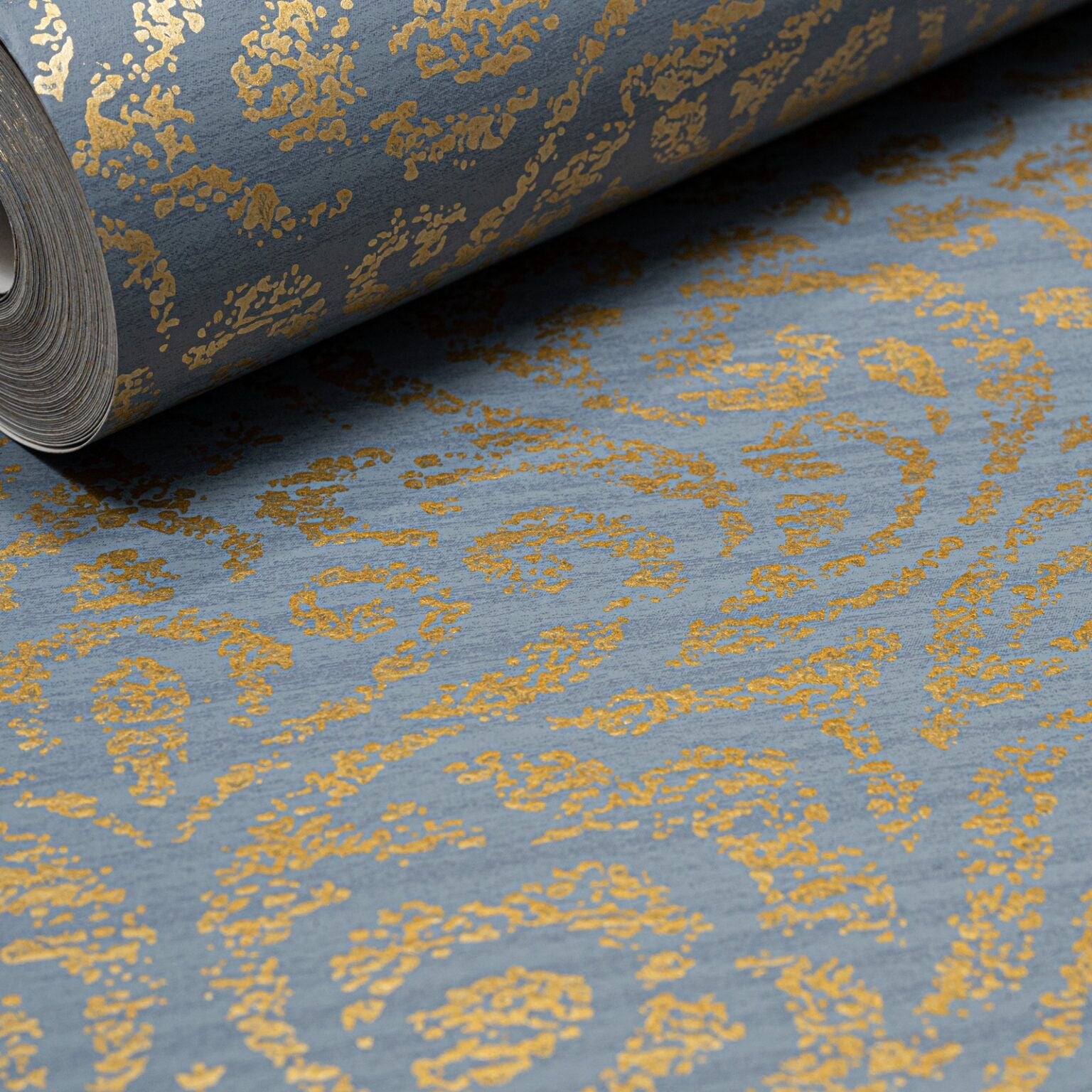 Blue Floral Damask Gold Metallic Shimmer Wallpaper roll close up showing distressed gold pattern