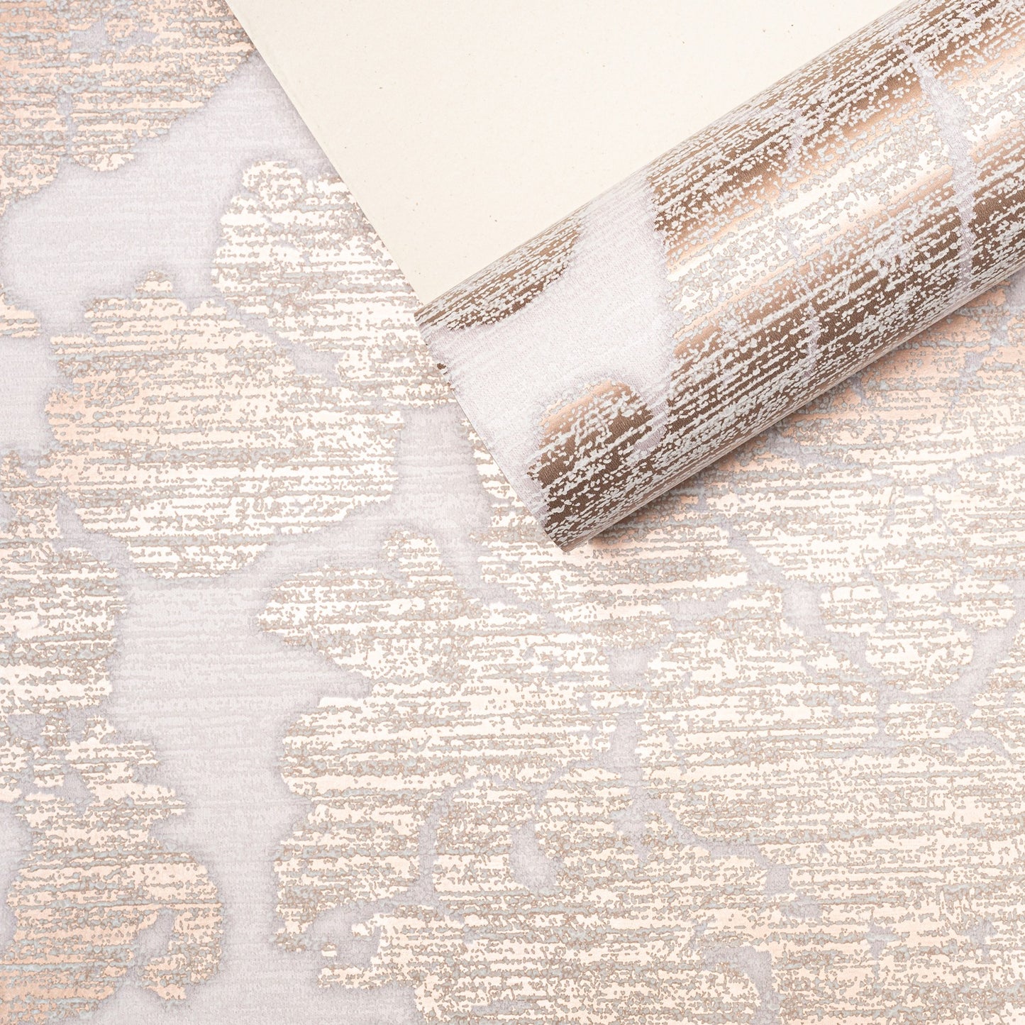 Rose Gold Damask Wallpaper roll with sample swatch showing pattern and reverse